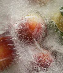 Ice texture with small round plums inside the layer of ice