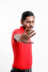 Happy Asian man in t-shirt and showing expression isolated over white background.