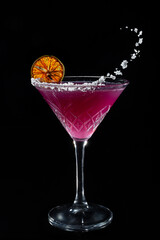 Margarita Cocktail Drink in Glass, Frozen Alcohol with Lime, flying Salt on black background.