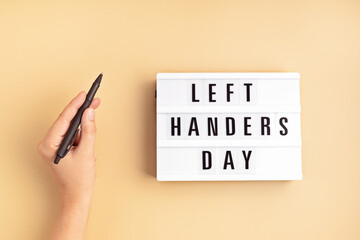 Light box with text left handers day
