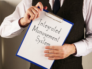 Integrated management system is shown on the business photo using the text