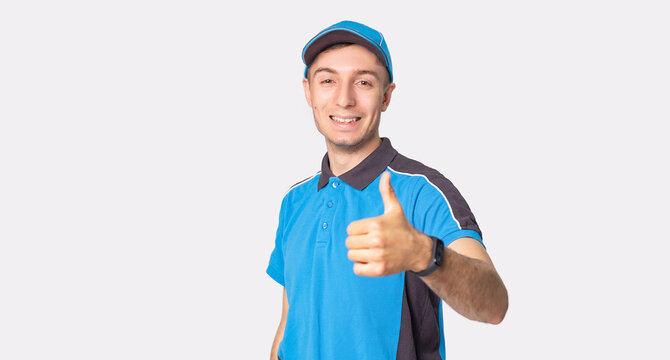 The courier man in work uniform holding his thumb up means he is happy for working as a delivery man. 