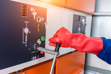 The engineer checks the absence of induced voltage on the high voltage cells
