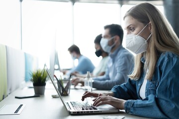 Group of business people wear protective face mask working in office with new normal lifestyle...