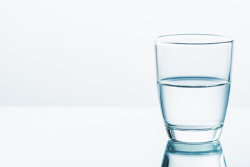 Half Full and Half Empty Glass - Powered by Adobe