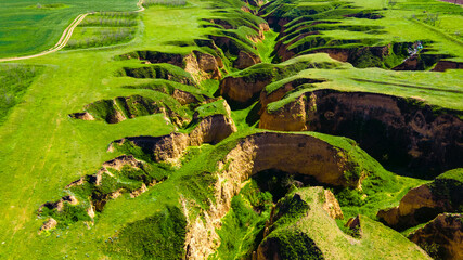 Canyon cliffs mountains green grass top view
