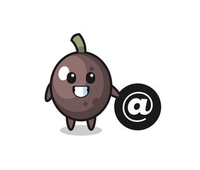 Cartoon Illustration of black olive standing beside the At symbol