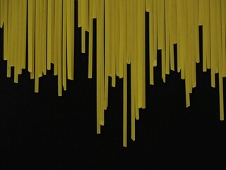 Spaghetti pasta on a black background