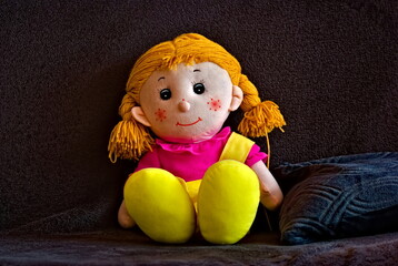 Siedząca, szmaciana lalka. Rag doll 