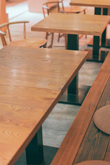 Traditional japanese machiya house or ryokan restaurant with wooden table and doors with natural bright light