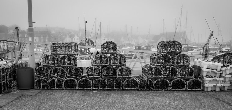 Stacked fishing pots, Anstruther Harbour, Anstruther, Fife, Scotland, UK