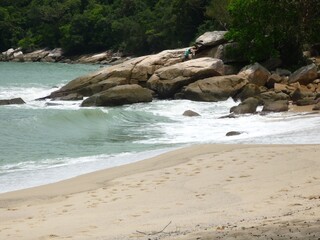 Beautiful view of the beach with blue sky and the trees