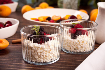 cottage cheese with berries and fruits apricot for healthy breakfast.
