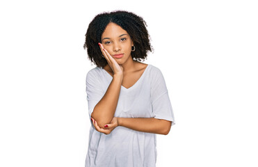 Fototapeta na wymiar Young african american girl wearing casual clothes thinking looking tired and bored with depression problems with crossed arms.