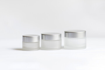 jar of cream on a white background