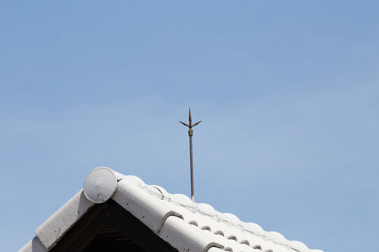 Air terminal rod or Lightning rod on the roof of a building for lightning protection systems and protect electrical equipment damage when raining and lightning strike.