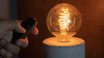 turning on the lamp filament light