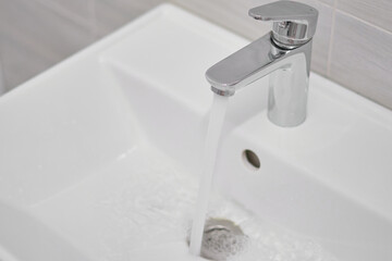 water flows from the tap                      