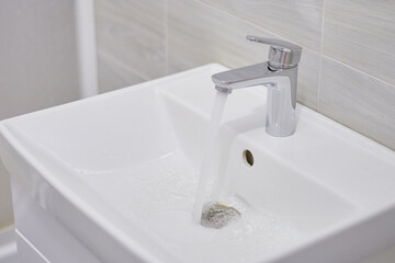 water flows from the tap                      