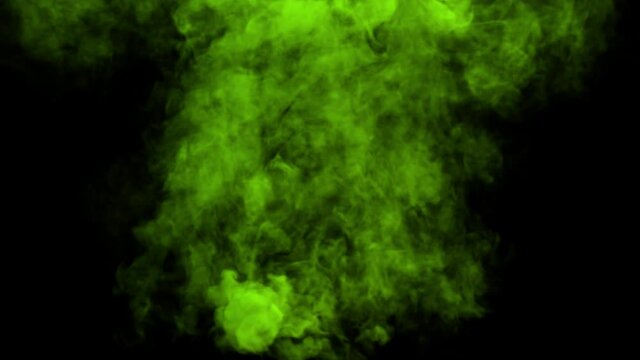 Rising green smoke dissipate completely on an alpha channel background.
