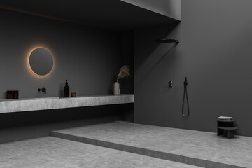 Dark grey bathroom with open shower near room corner and illuminated mirror
