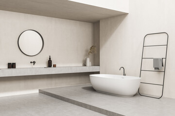 Obraz na płótnie Canvas Beige bathroom with tub and accent round mirror