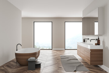 Modern bathroom interior with wood and stone decor elements and big window. Concept of contemporary design and spa relaxation.