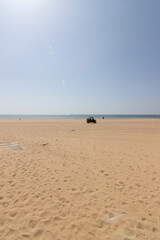 Fototapeta na wymiar una de las playas mas bonita de España, la de Mazagon. En la provincia de Huelva. Con su arena fina, dunas y vegetacion verde