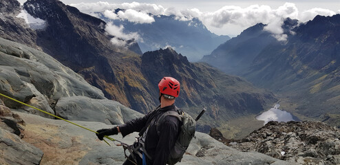 Rwenzori Mountains National Park, Uganda - February 26, 2020: Bartek Zobek descending from Mount Stanley