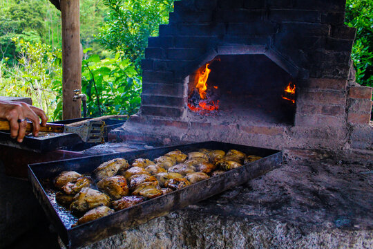 Delicious chicken cooked from an oven made of brick and cement in the middle of the mountain in the rural area of Puriscal Costa Rica