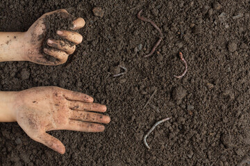 Hand holding black soil for cultivating crops world soil day concept