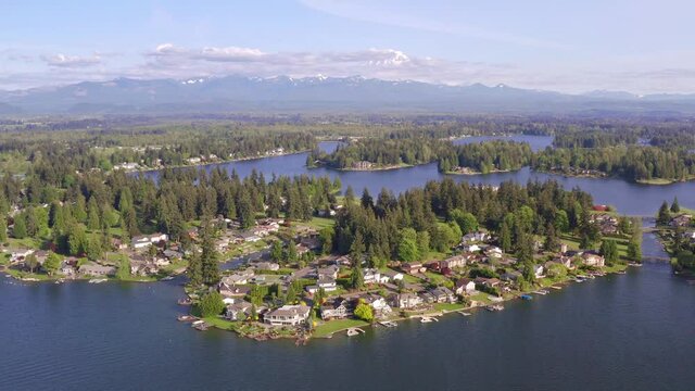 Short Backwards Preview of the Island Homes Real Estate on Lake Tapps with Rainier on the Horizon