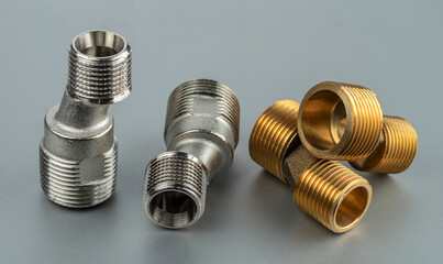 Two pairs of eccentrics connectors in brass and stainless steel. Eccentric mixer adapter faucet.