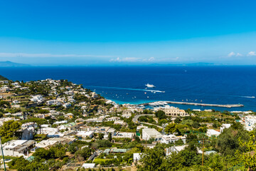 Beautiful panorama of sea and bay on Capri island full of trees and buildings