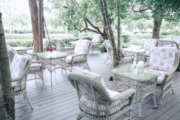 the balcony with garden view. Table with chair and beautiful sunlight on summer