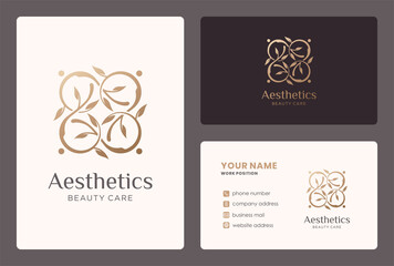 aesthetic logo with leaf branch element and business card design.