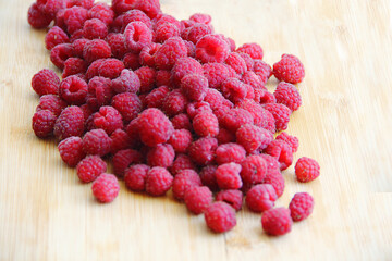 fresh raspberries on a white background close-up