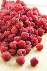 fresh raspberries on a white background close-up