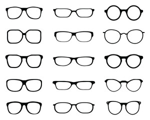 Black silhouettes of different eyeglasses on a white background	