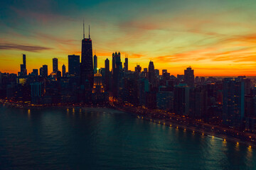 Fototapeta na wymiar Beautiful sunset above Chicago lakefront skyscrapers, aerial view