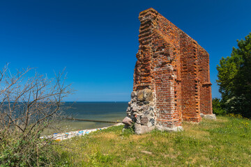 Obraz premium Ruins of the Church of Saint Nicholas from the 15th century in Trzesacz, Poland