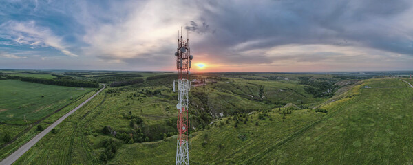 Telecommunication tower 5G, wide panorama 180. Wireless GSM Antenna connection system of...