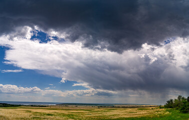 amazing beautiful summer landscape with cirrus dramatic sky panorama before storm rain