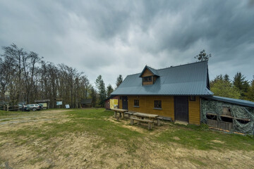 Wielki Lubon, Poland: A shelter located at a peak of polish mountain during cloudy rainy weather located in a region of Beskid Wyspowy, a touristic place for people who likes hiking