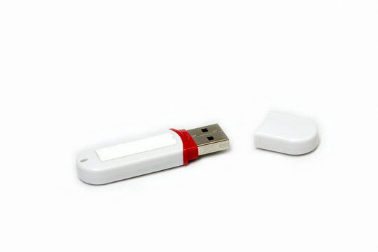 White USB Pen Drive With An Open Cap, Isolated On White Background