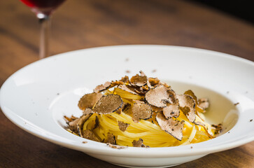 Pasta with truffles. Restaurant menu plate.	