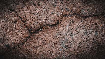 Cracked damaged concrete surface as background