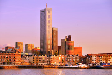 Fototapeta na wymiar Dominant skyscraper at waterfront district in Rotterdam