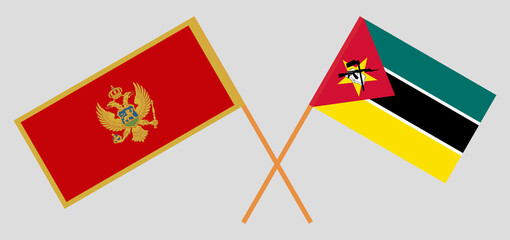 Crossed flags of Montenegro and Mozambique. Official colors. Correct proportion