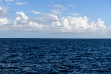 Fototapeta premium Seascape, blue sea. Calm weather. View from vessel.